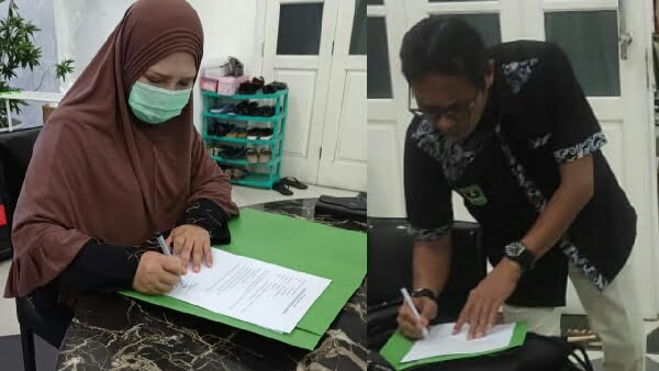Irwan Prayitno dan Nevi Zuairina menandatangani Kesediaan sebagai Anggota Koperasi Jaringan Pemred Sumbar