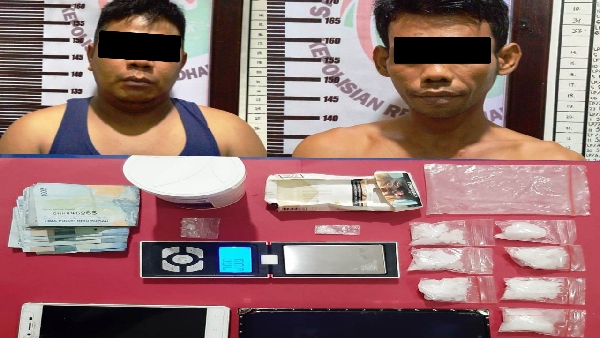 Dua pengedar Narkoba yang diamankan satuan Narkoba Polres Dharmasraya
