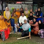 Ketua DPRD Kota Padang, Muharlion, menghadiri kegiatan Malamang