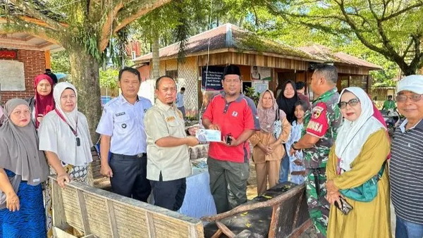 Ketua DPRD Kota Padang Muharlion, S. Pd.